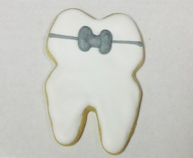 Tooth with Brace